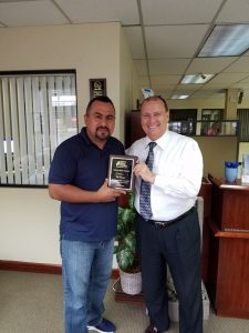 Craig Candelore of the Men’s Legal Center presenting Joe Vargas with Great Dad Award