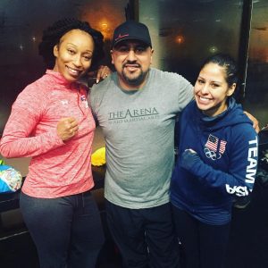 Joe Vargas working with 2012 USA Boxing National Champion Raquel Miller (left) and U.S. 2012 Olympic Bronze Medalist Marlen Esparza (right)