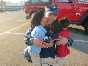 navy divorce lawyer's client greeted by children at parking lot