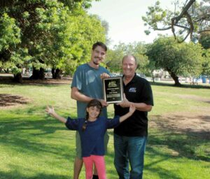 Jesse And Fiona receiving the Plaque