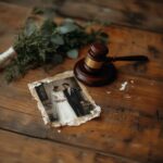 A wedding photo beside a gavel, symbolizing the end of a marriage.