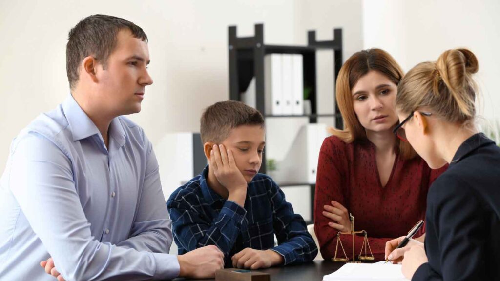 Family meeting with an attorney in a professional office setting