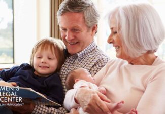 Grandparents spending time with their grandkids in the living room.
