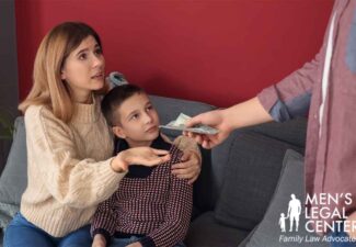 Man giving cash to his wife while sitting in their living room