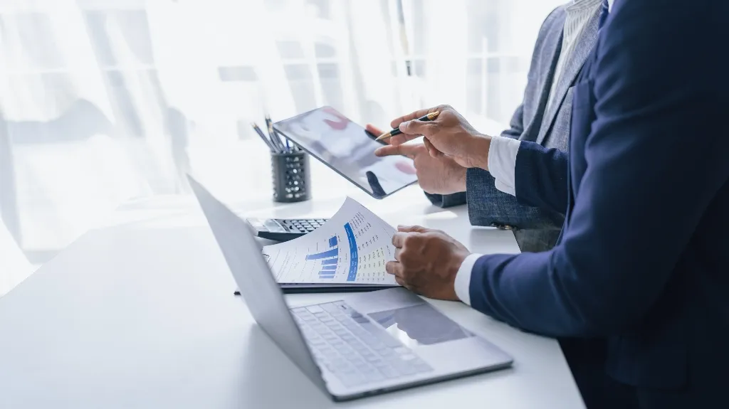 Man and lawyer are reviewing taxes